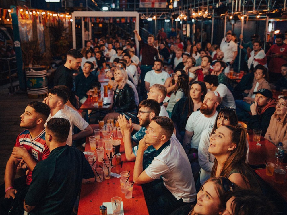 Fans watching a football match at SPARK York