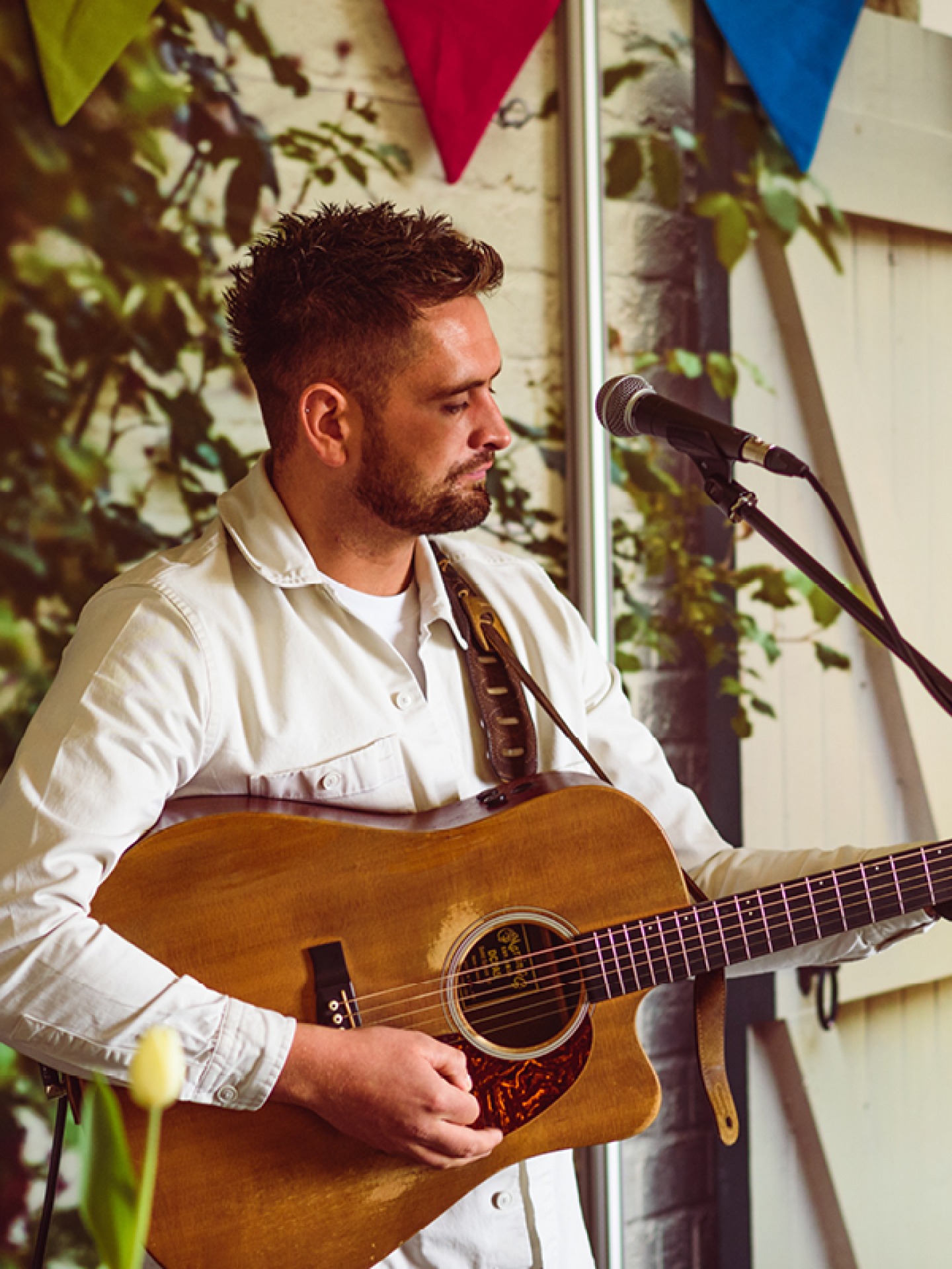 Singer playing guitar