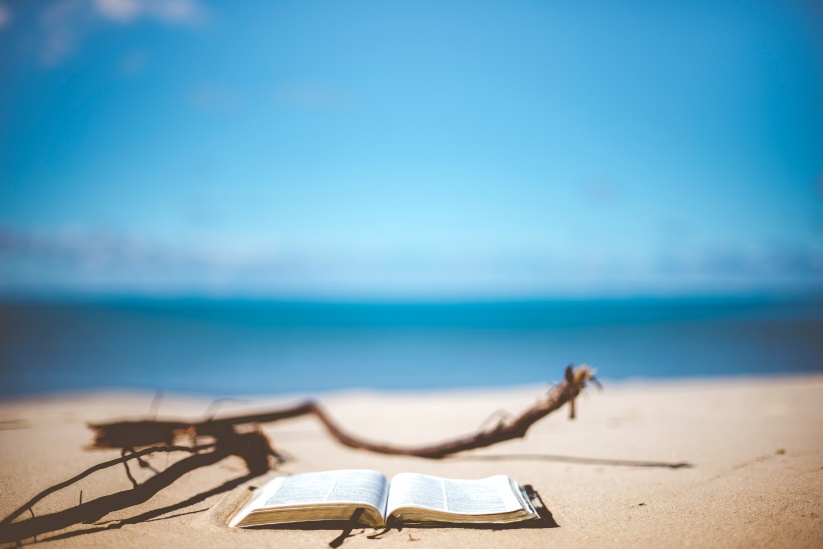 Unsplash, reading on beach