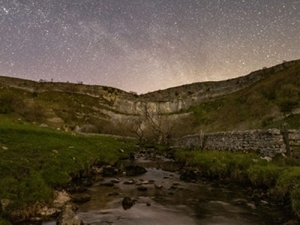 night sky over a cliff