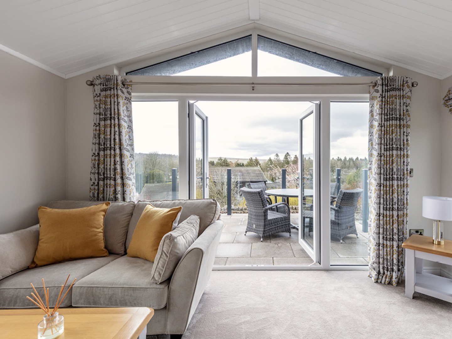 lodge living room with balcony view