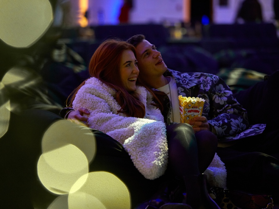 couple sat watching a film